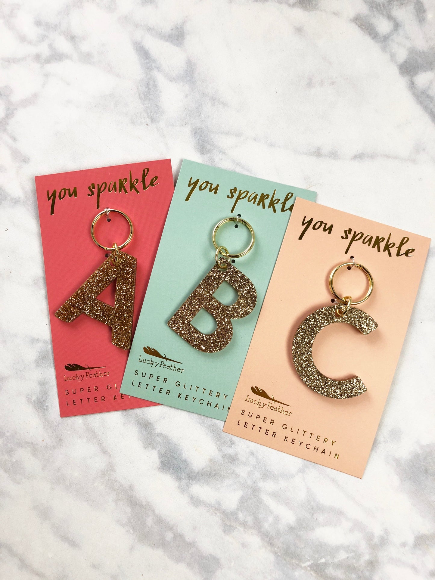 Load image into Gallery viewer, Glitter Acrylic Initial Keychains
